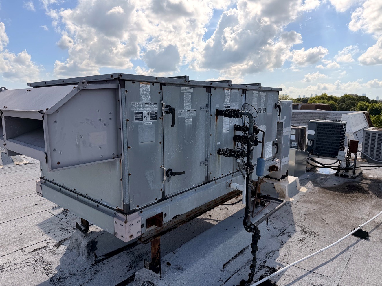 Commercial rooftop HVAC equipment serviced by JC Appliance and Services