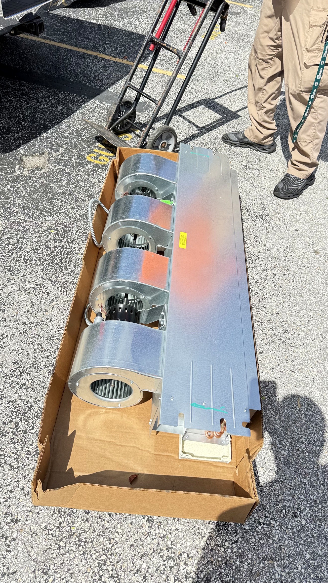 New blower assembly prepared for HVAC installation