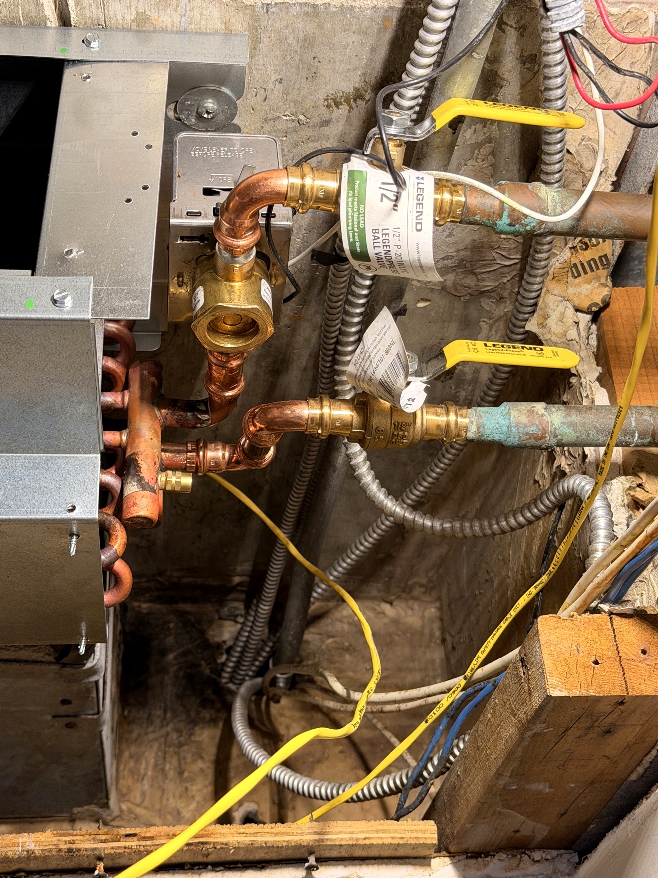 Copper piping and service valves inside HVAC equipment