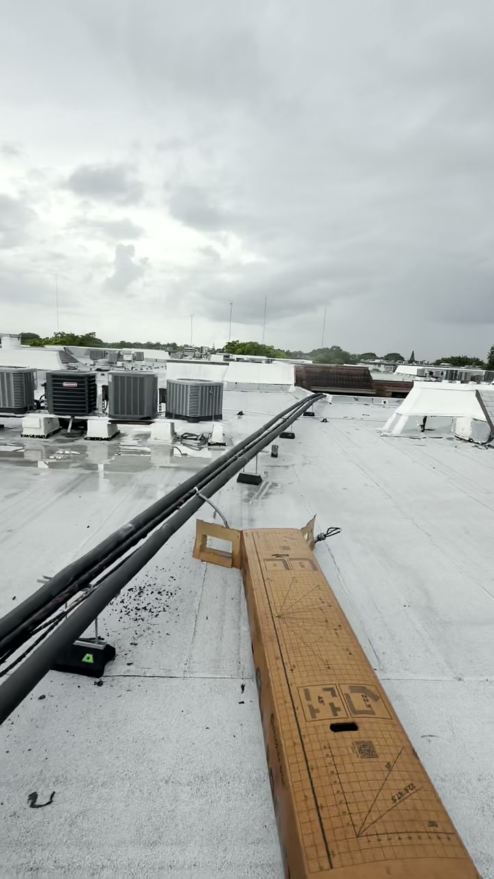 Multiple commercial HVAC systems across a Miami rooftop