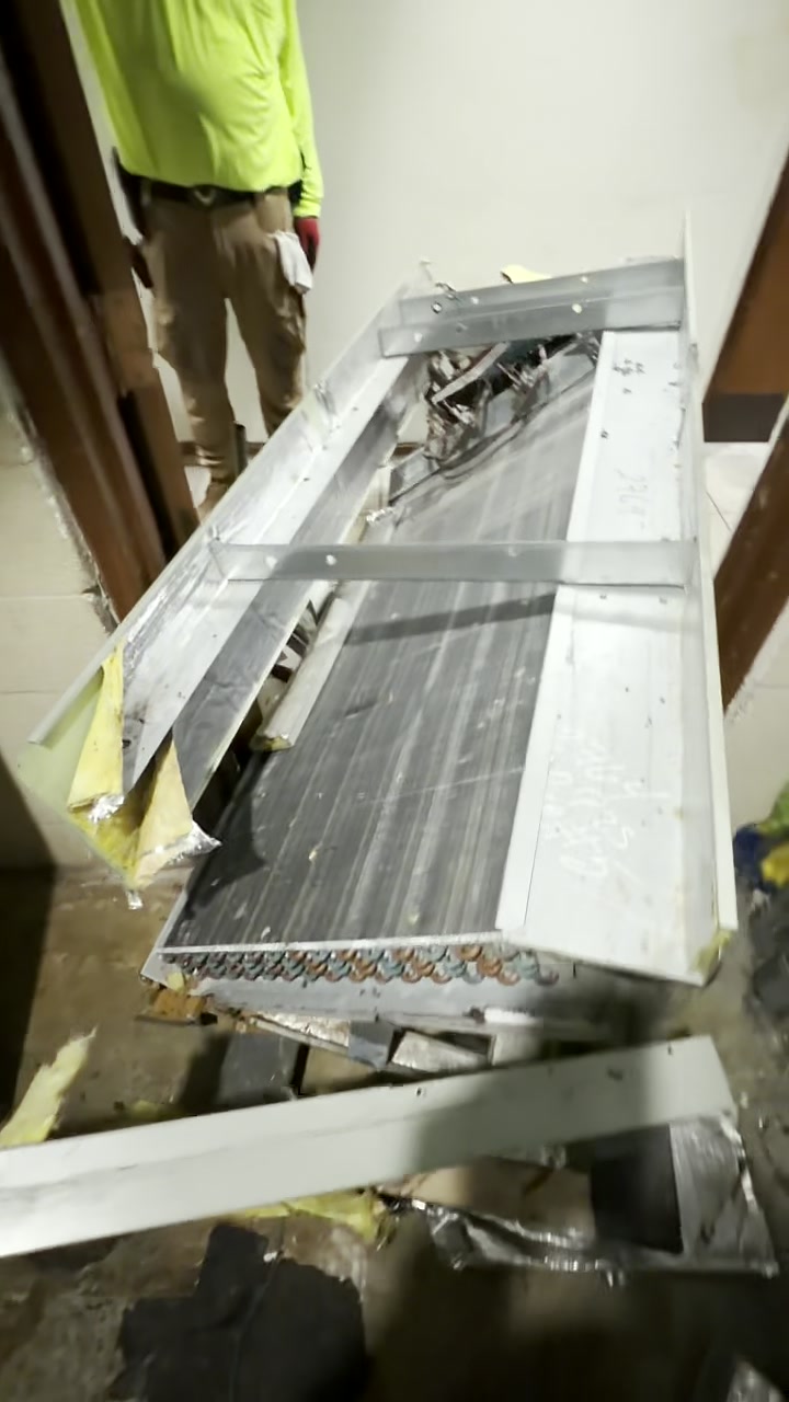 HVAC evaporator coil assembly removed for service